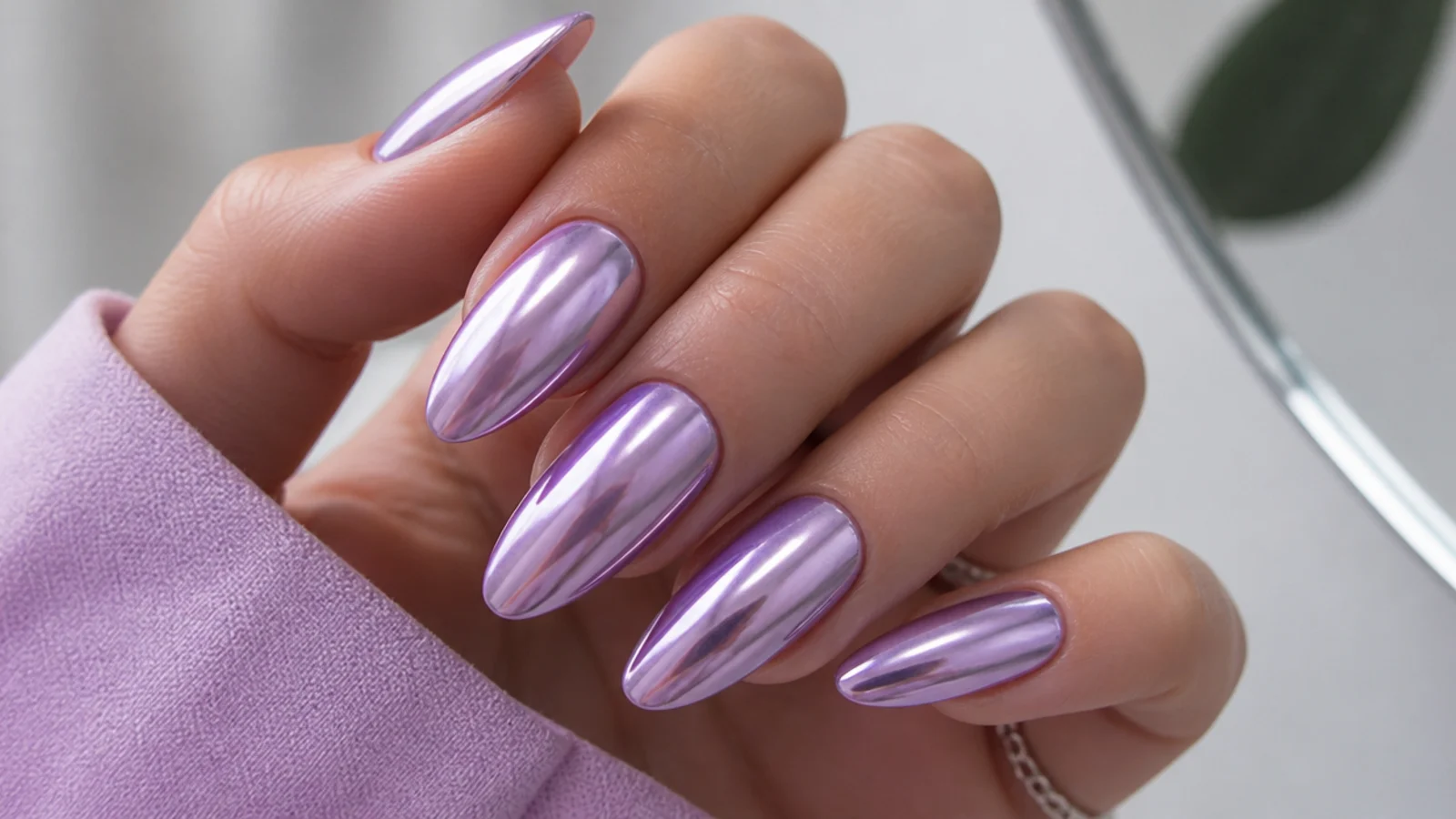 Light purple chrome nails with a mirror metallic lilac finish