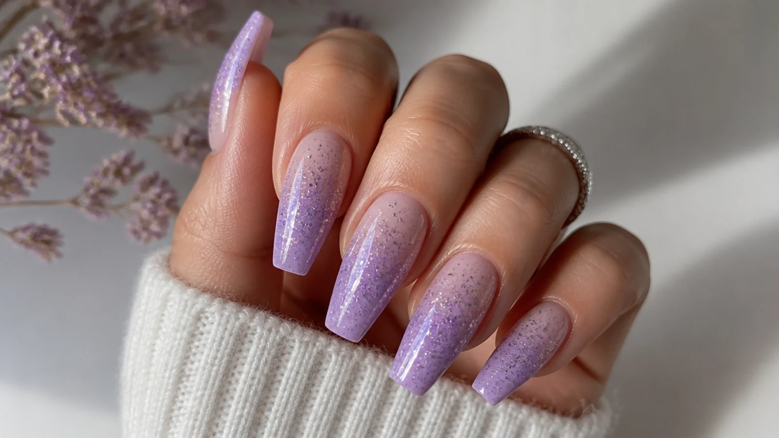 Long light purple ombre nails with glitter fade for prom