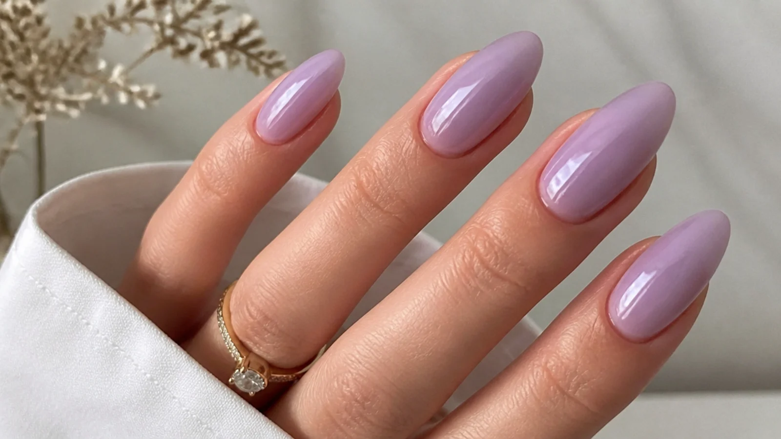 Semi-sheer milky light purple nails with a glazed finish