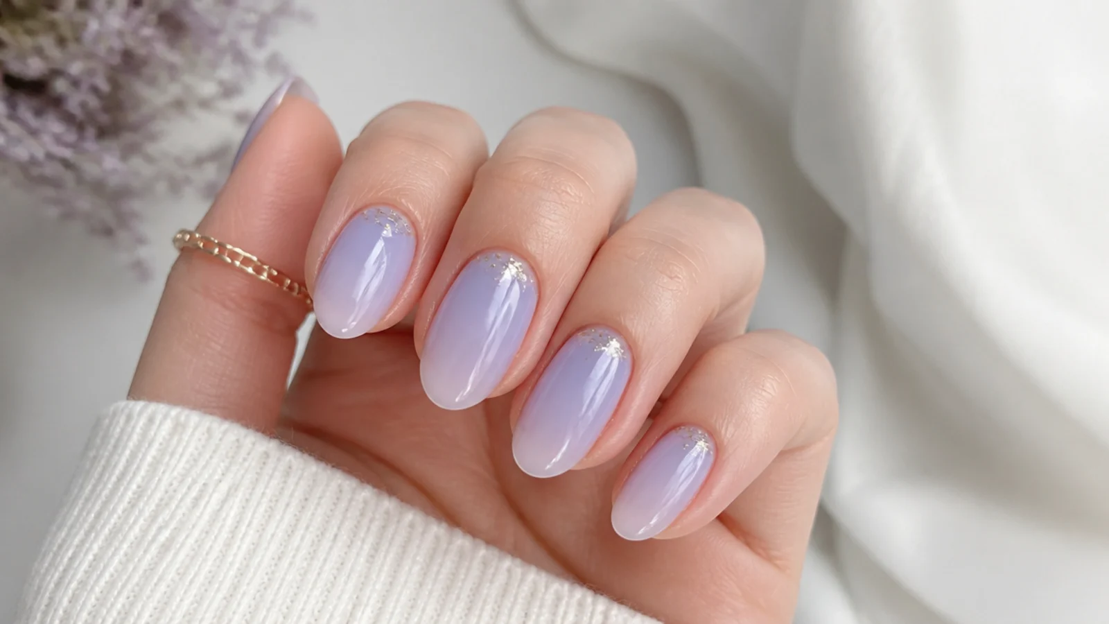 Sheer milky lilac light purple nails with a soft translucent finish