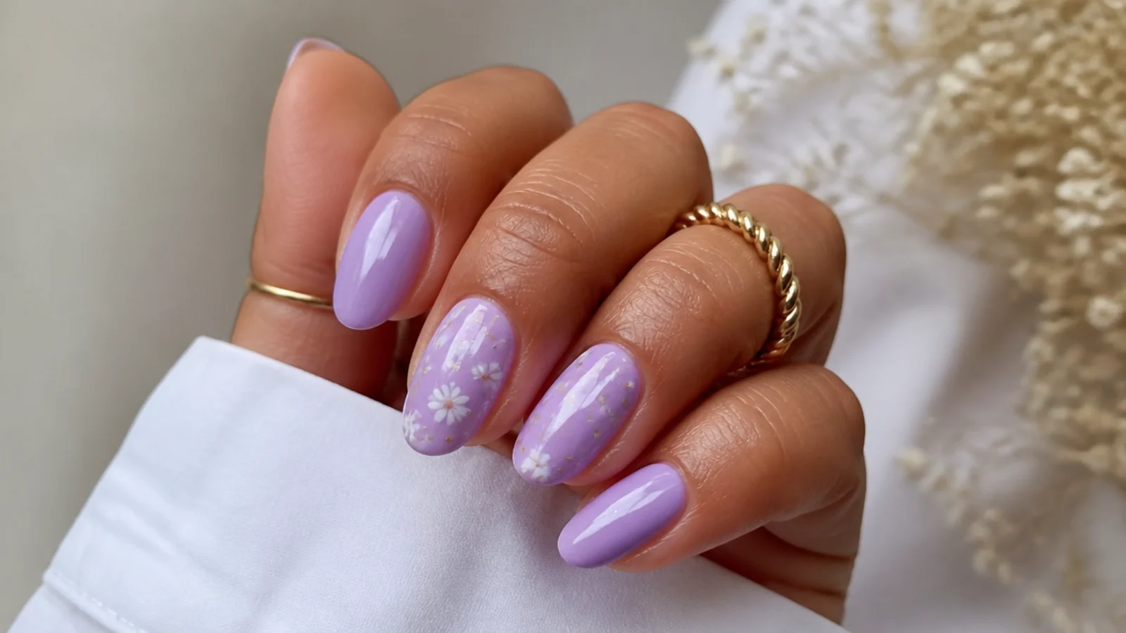 Saturated pastel lavender light purple nails on medium olive skin