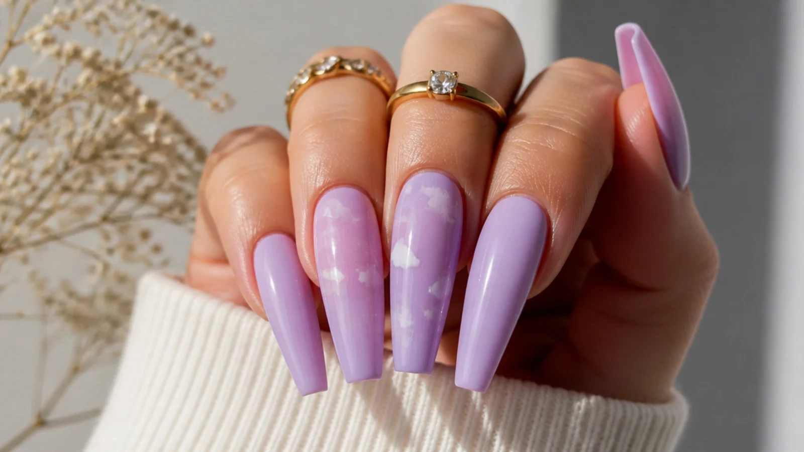 Long light purple nails on a tapered coffin ballerina shape