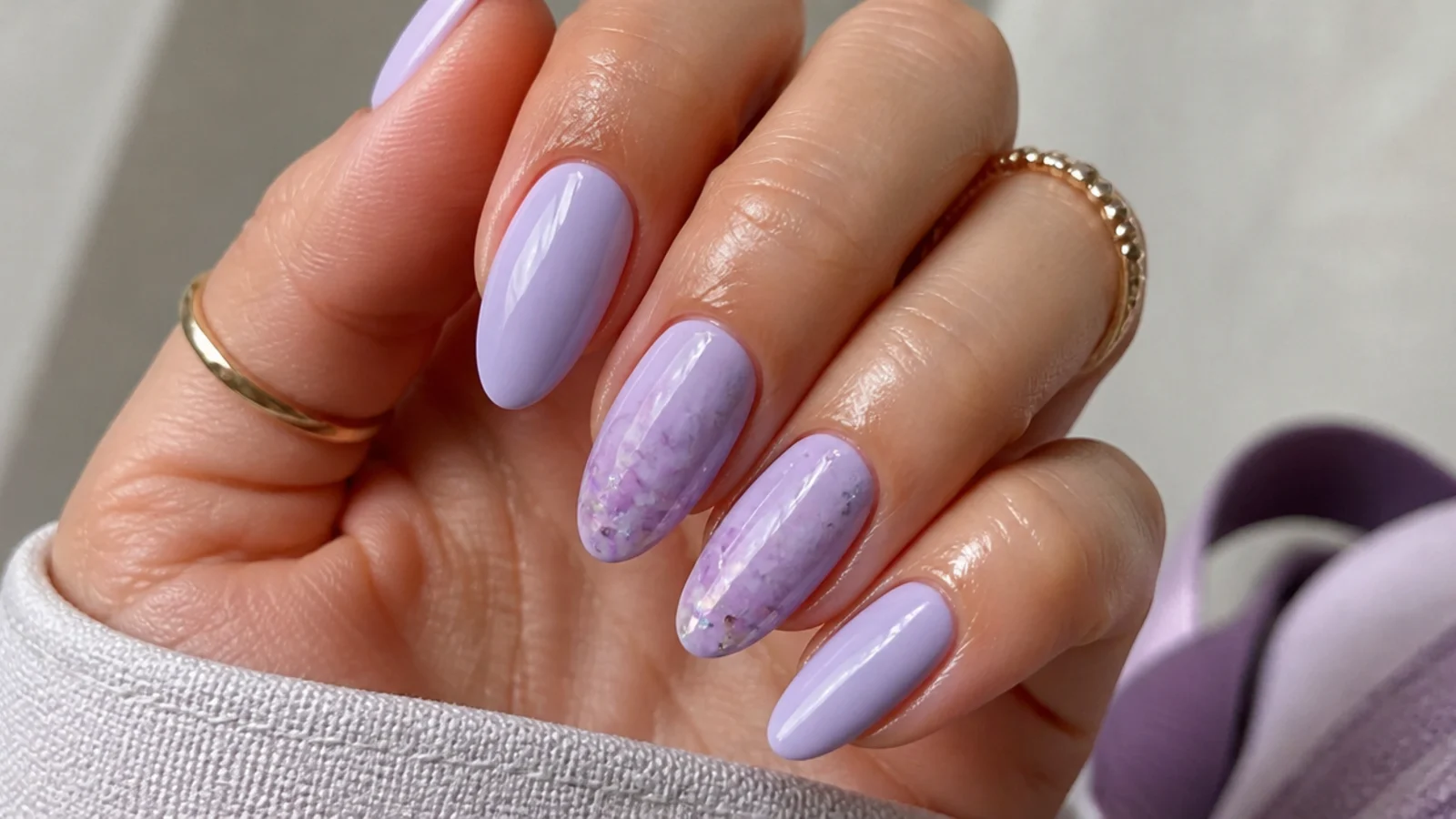 A well-sealed light purple gel manicure with cuticle oil for longevity