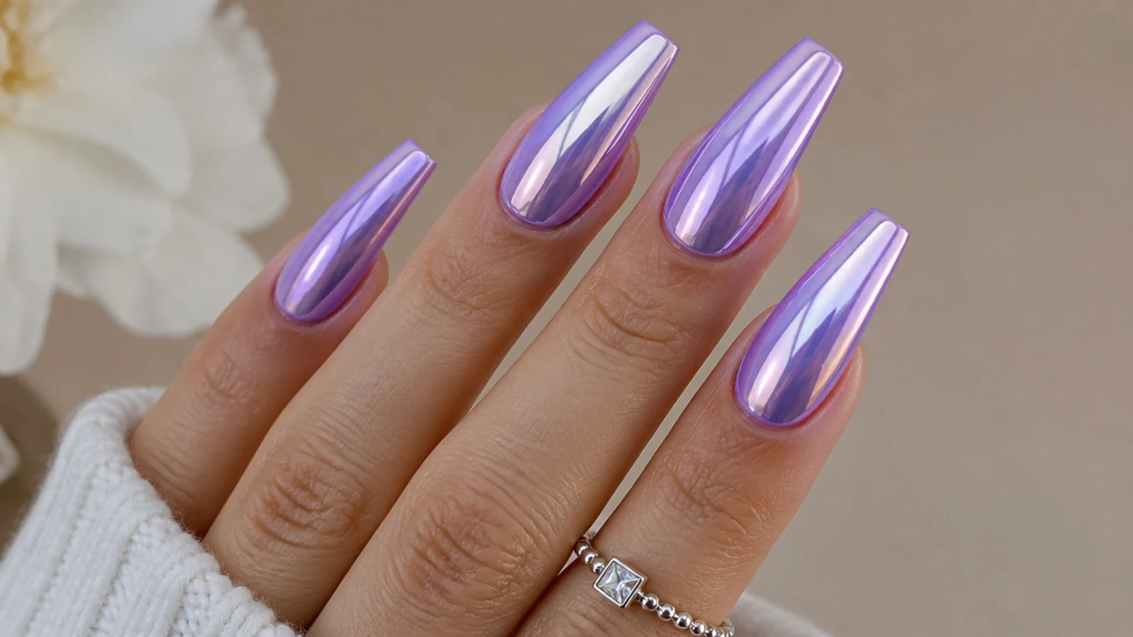 High-shine lilac chrome mirror prom nails on a coffin shape