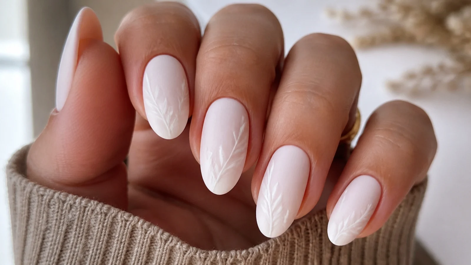 Soft matte white nails on a short almond shape