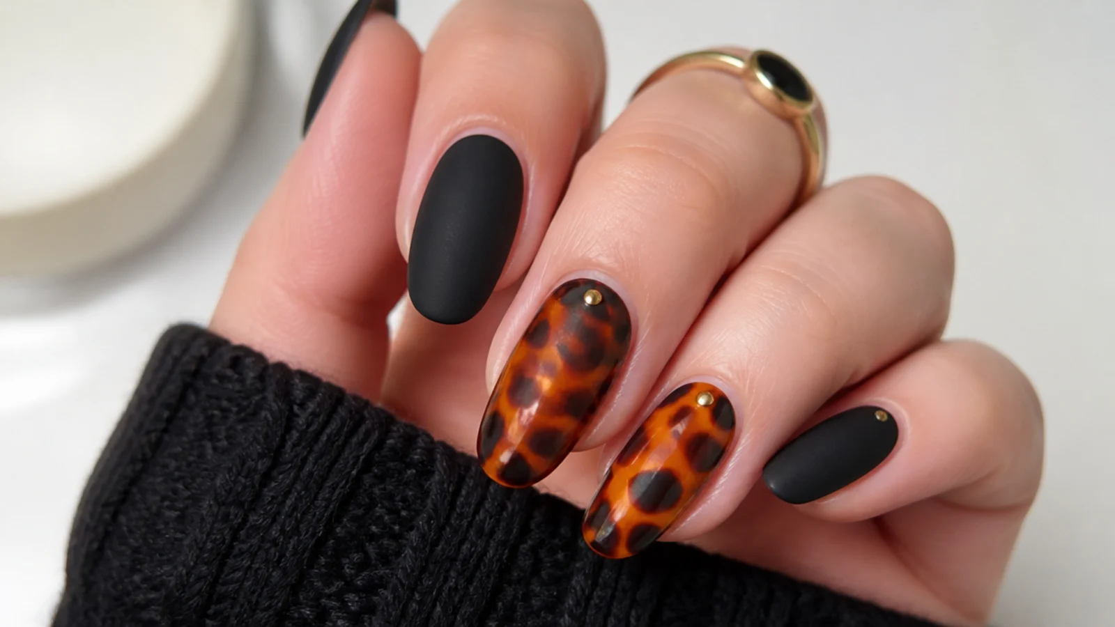 Matte black and amber tortoiseshell nails