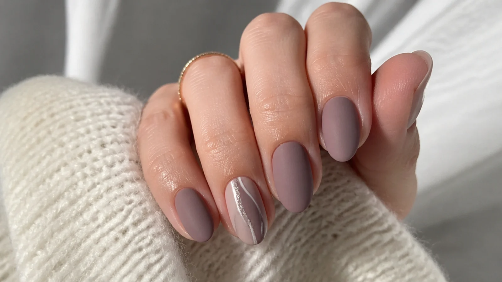 Muted matte mauve taupe nails on short almond nails