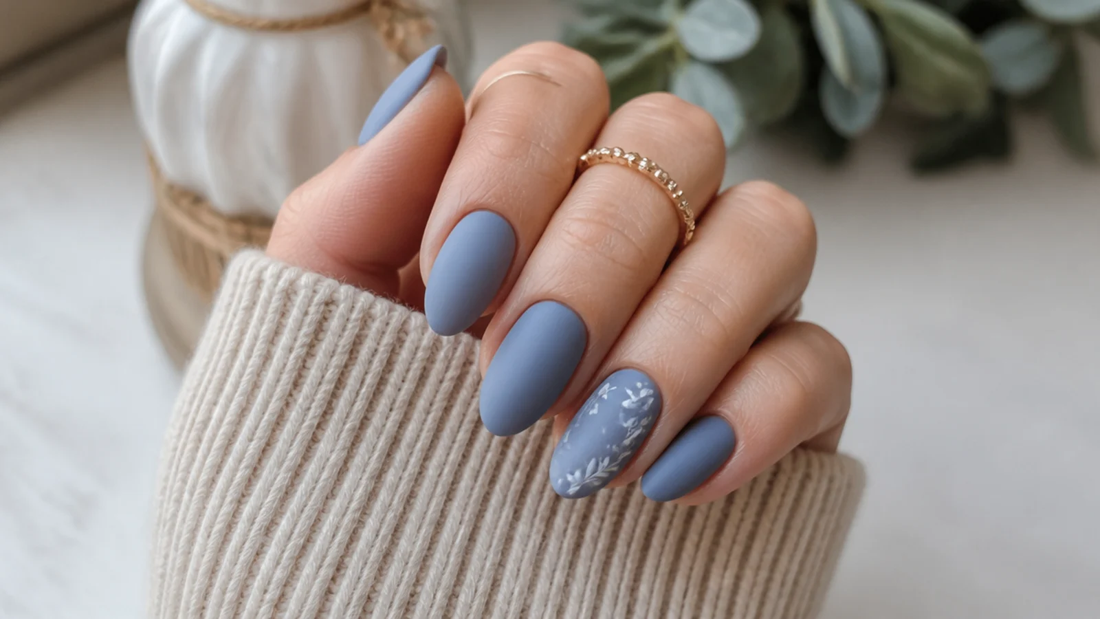 Soft matte dusty blue nails on short almond nails