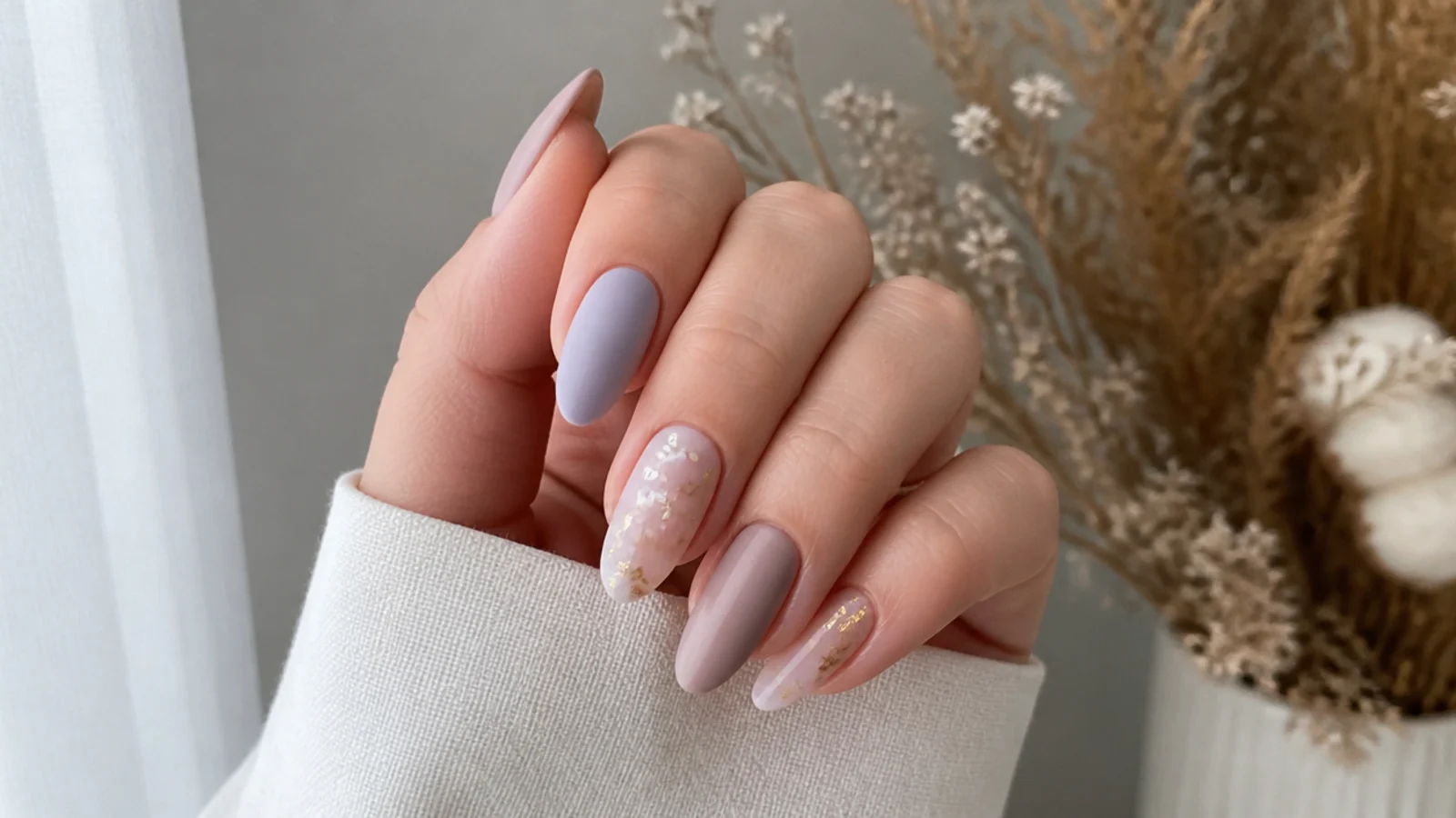 A well-sealed matte gel manicure held up to show an even flat finish