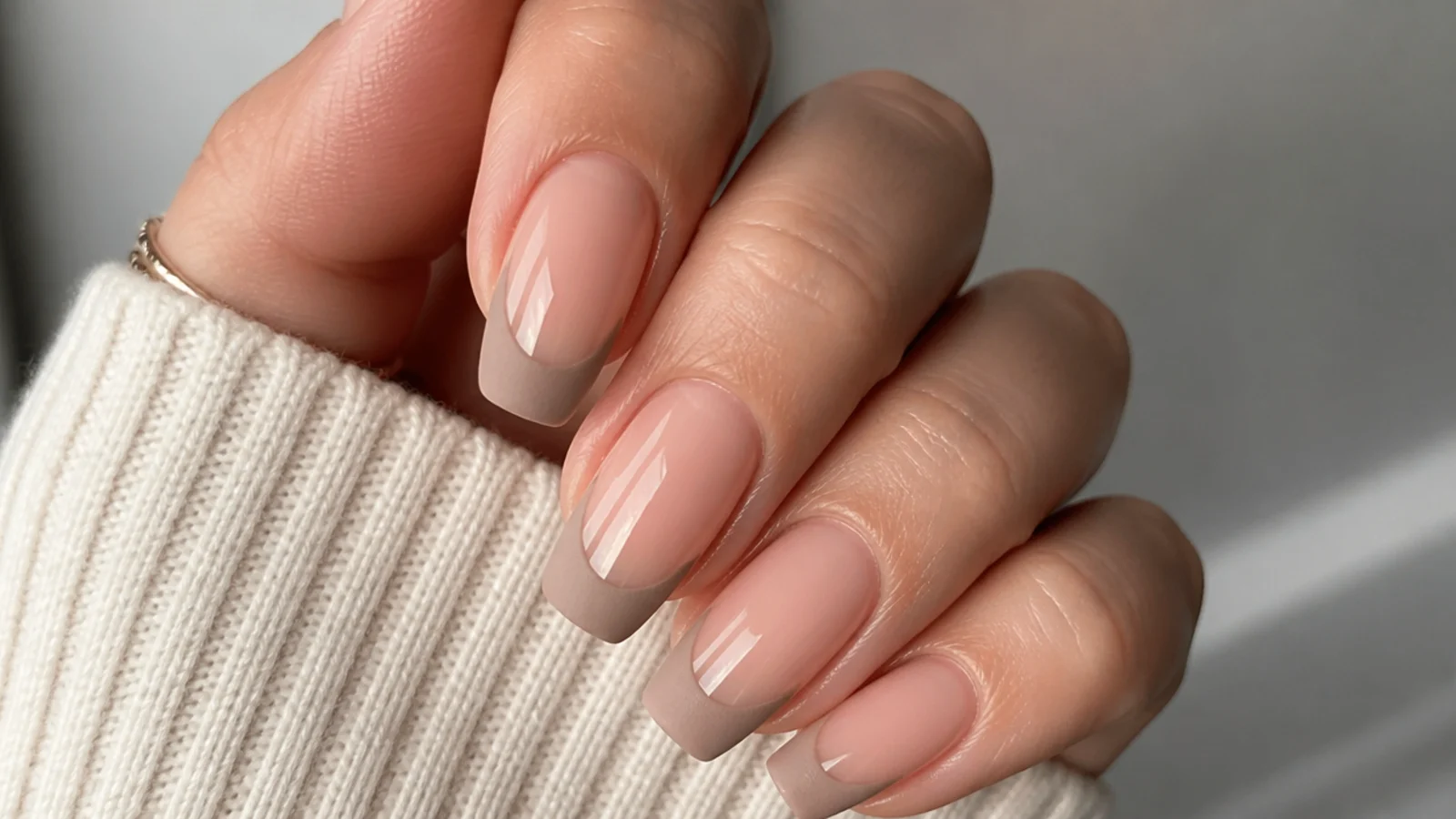 Glossy nude nails with a matte nude tip block