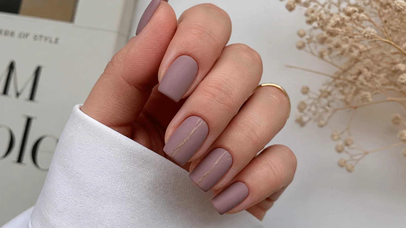 Dusty mauve nude matte nails on squoval shape
