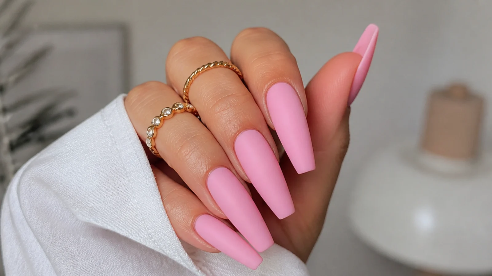 Long matte pink coffin nails with straight tapered sides