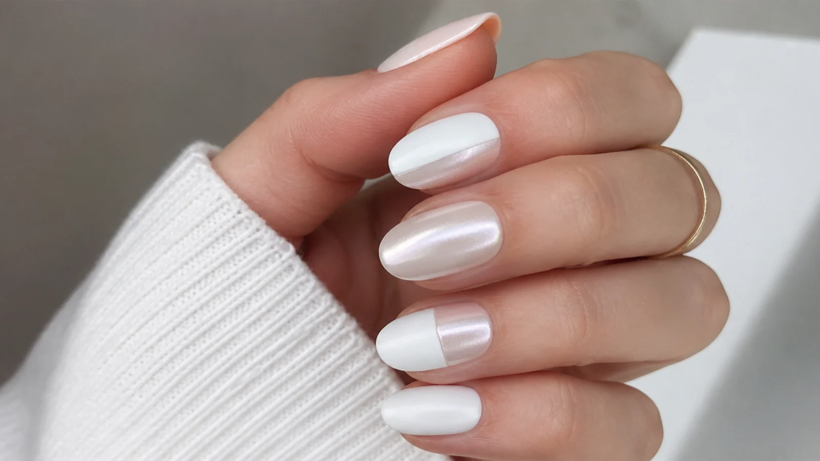 Matte white nails split with a glazed pearl chrome half