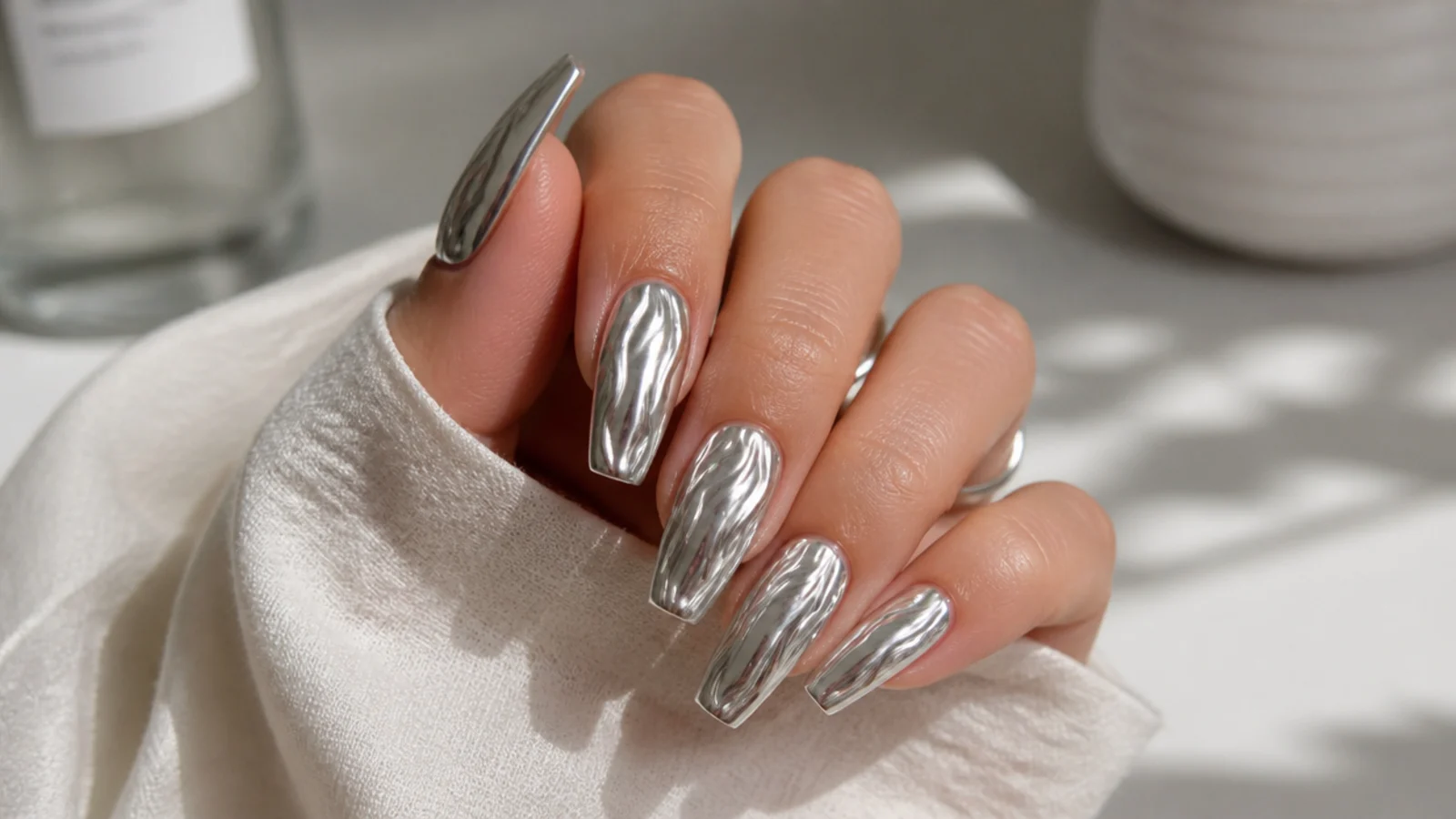 Medium coffin nails with a rippled molten silver metal three-dimensional finish