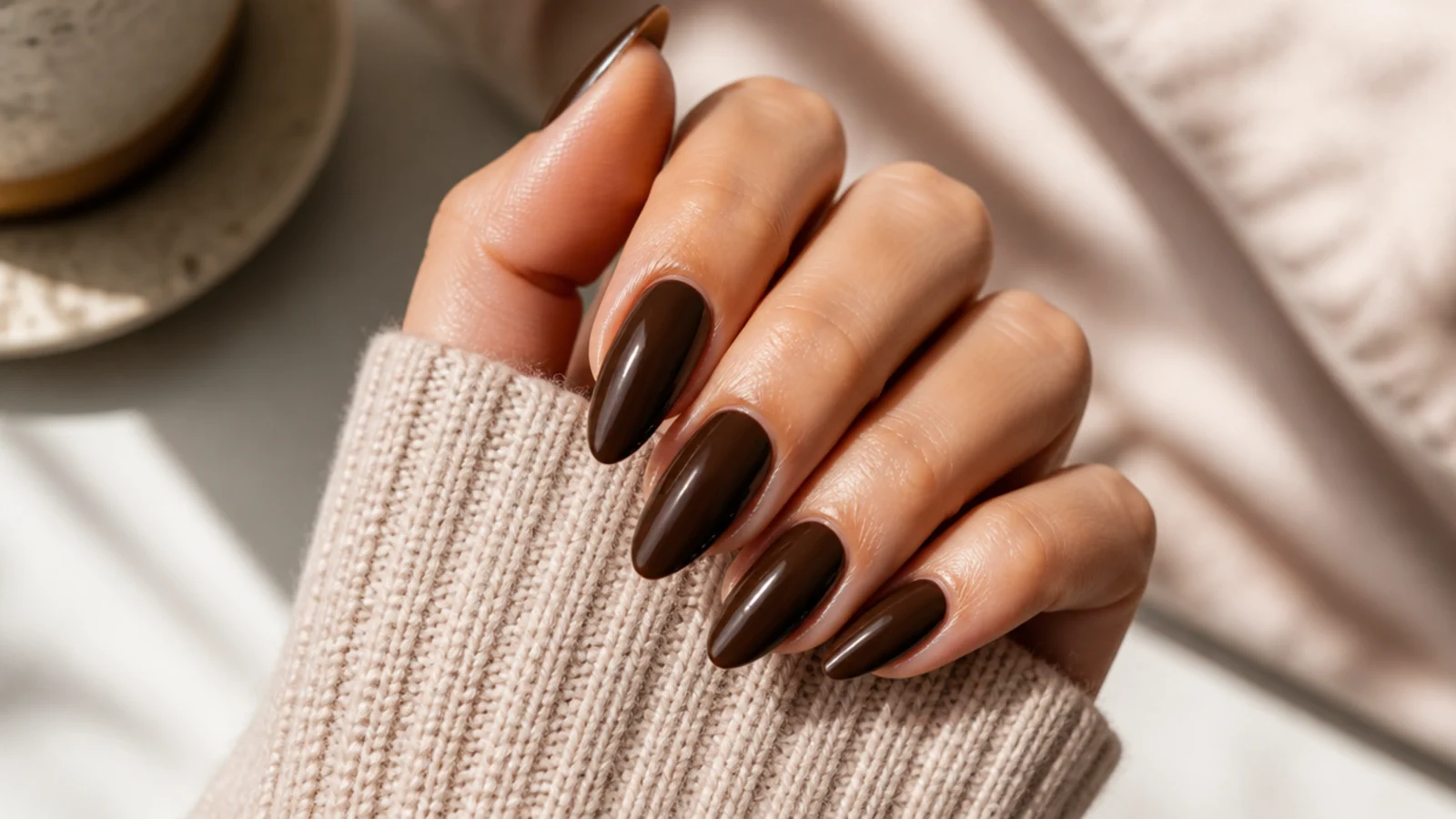 Almond mocha brown acrylic nails with a deep cool toned coffee brown glossy finish