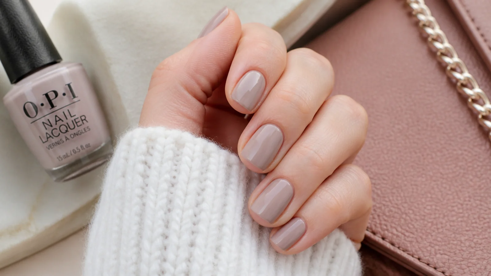 Short nails in soft greige OPI Berlin There Done That with a muted opaque finish