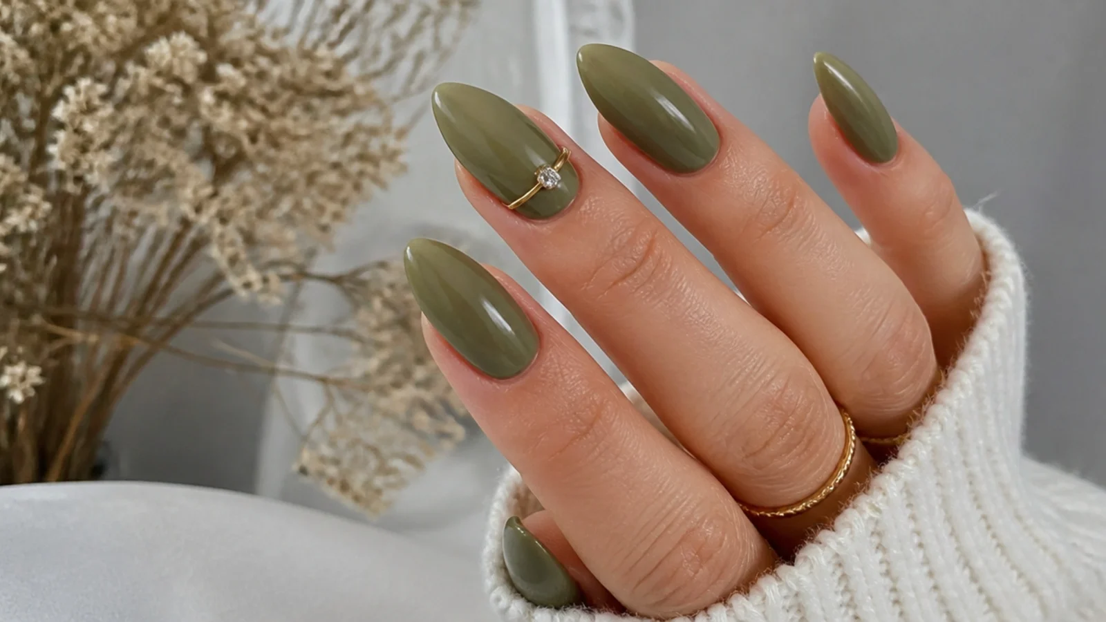 Long light olive green almond nails with high gloss