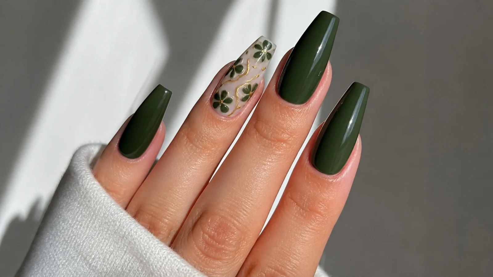 Deep dark olive green acrylic nails on a long coffin shape