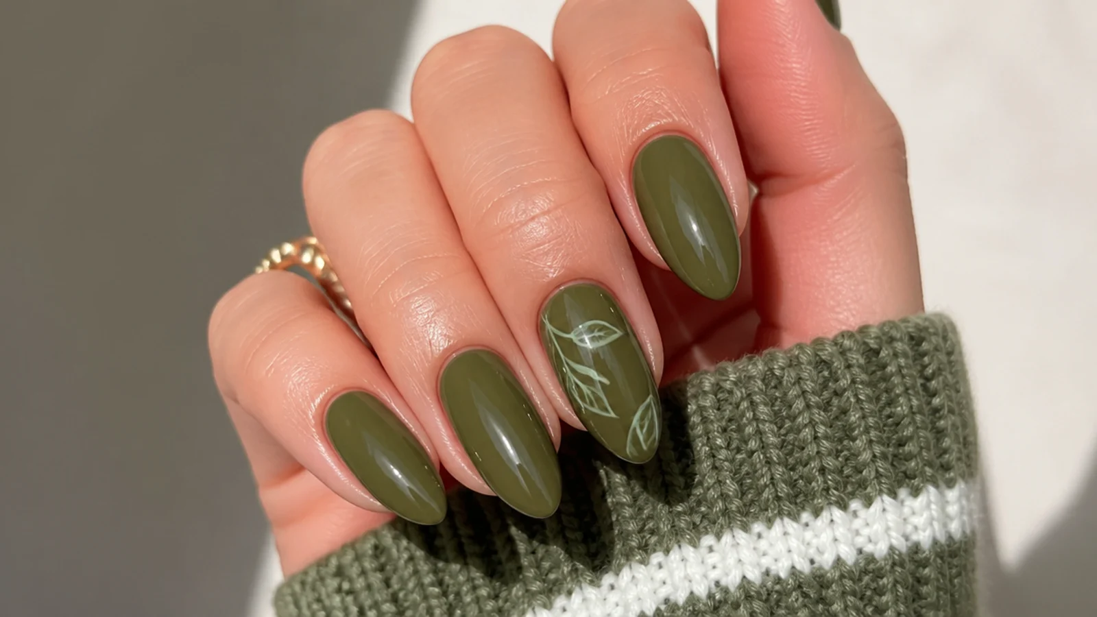 A well-sealed warm olive almond manicure with cuticle oil