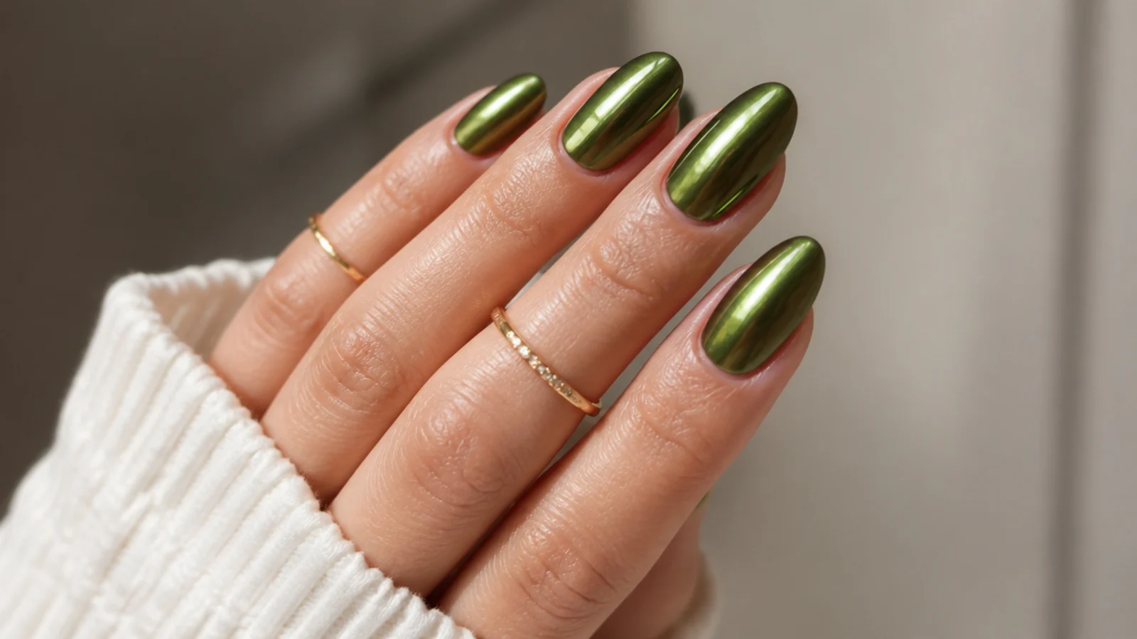 Rich saturated deep olive green chrome nails with high-gloss mirror shine