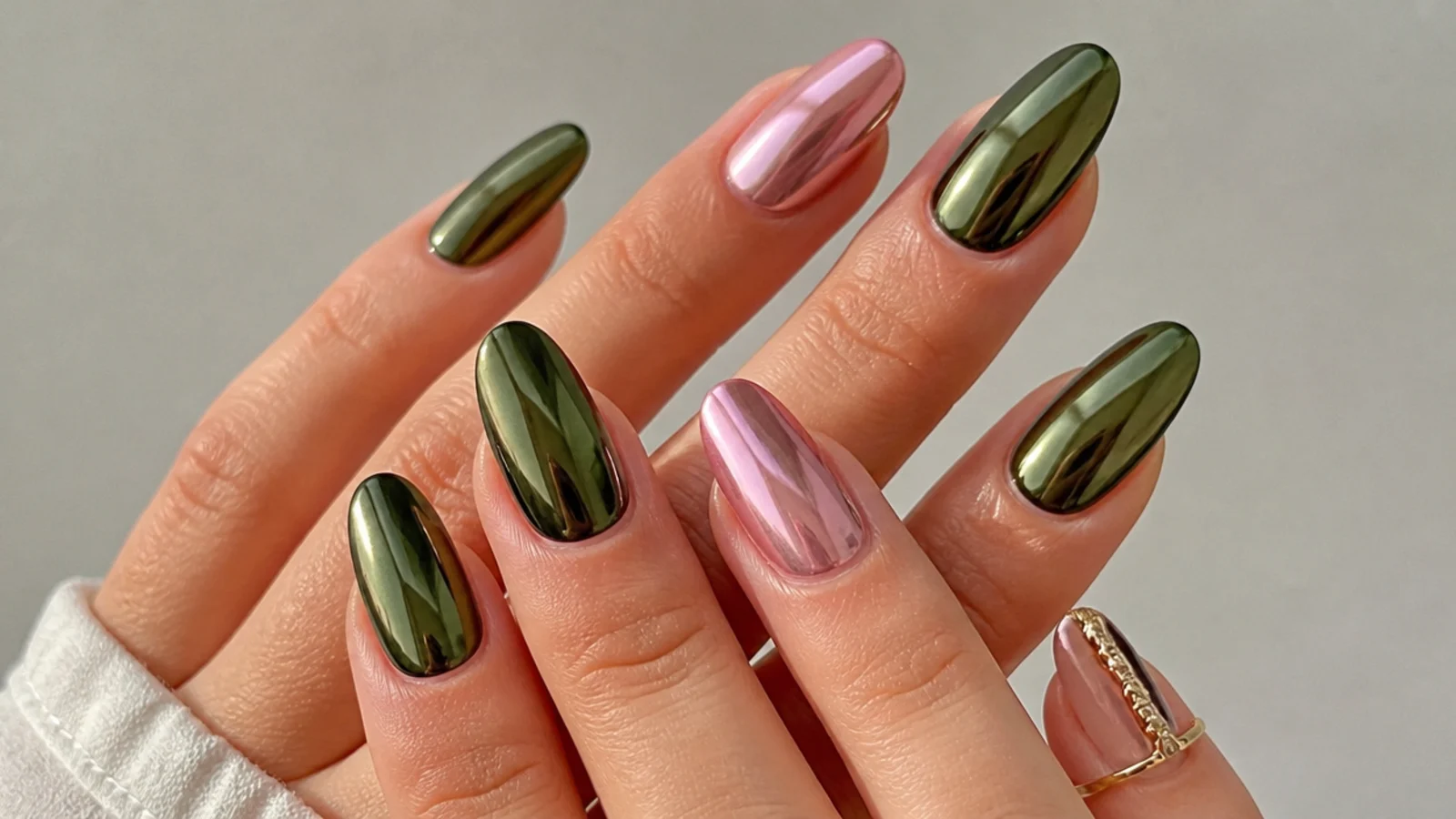 Olive green chrome nails with soft pink chrome accent nails