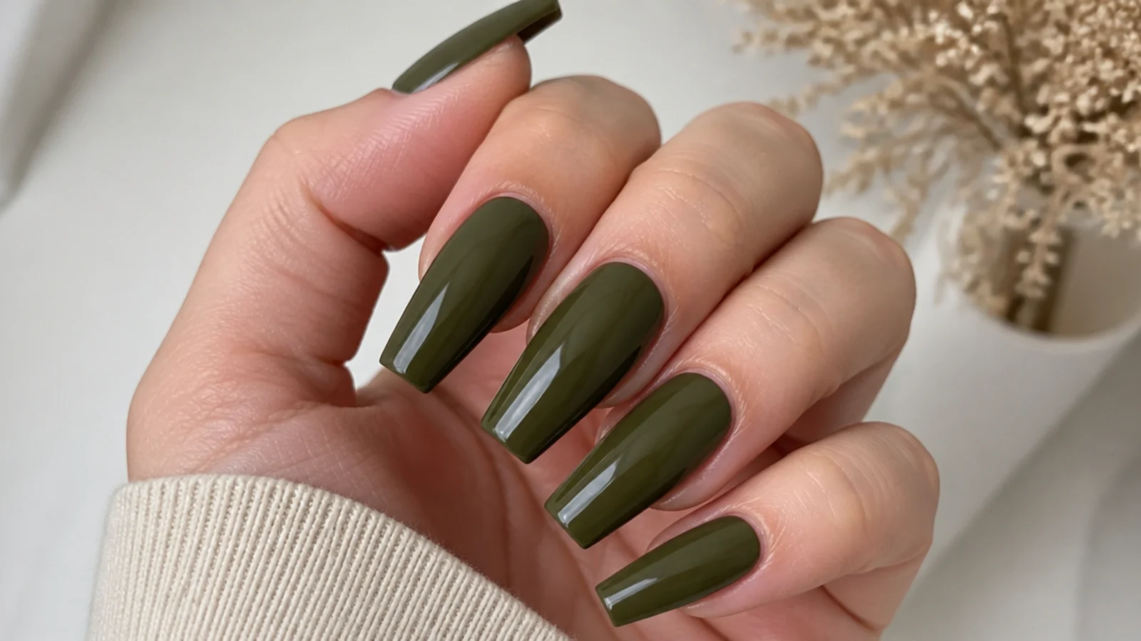 Deep dark olive green coffin nails with a glossy finish
