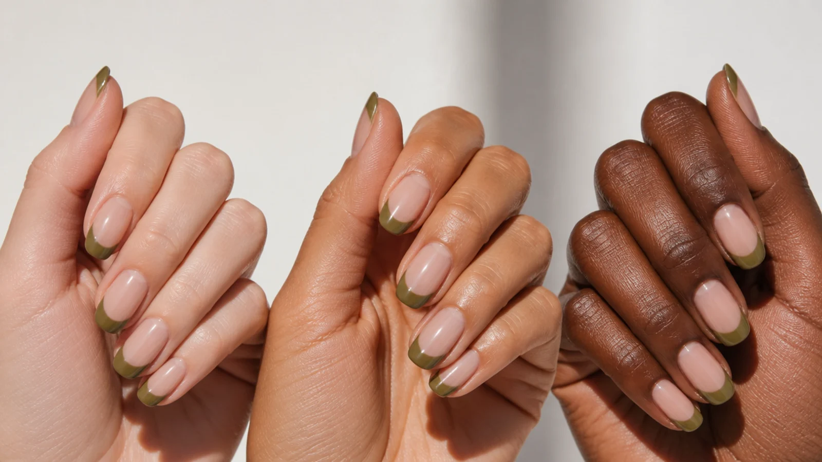 Three olive green french tip swatches on fair, tan and deep skin hands