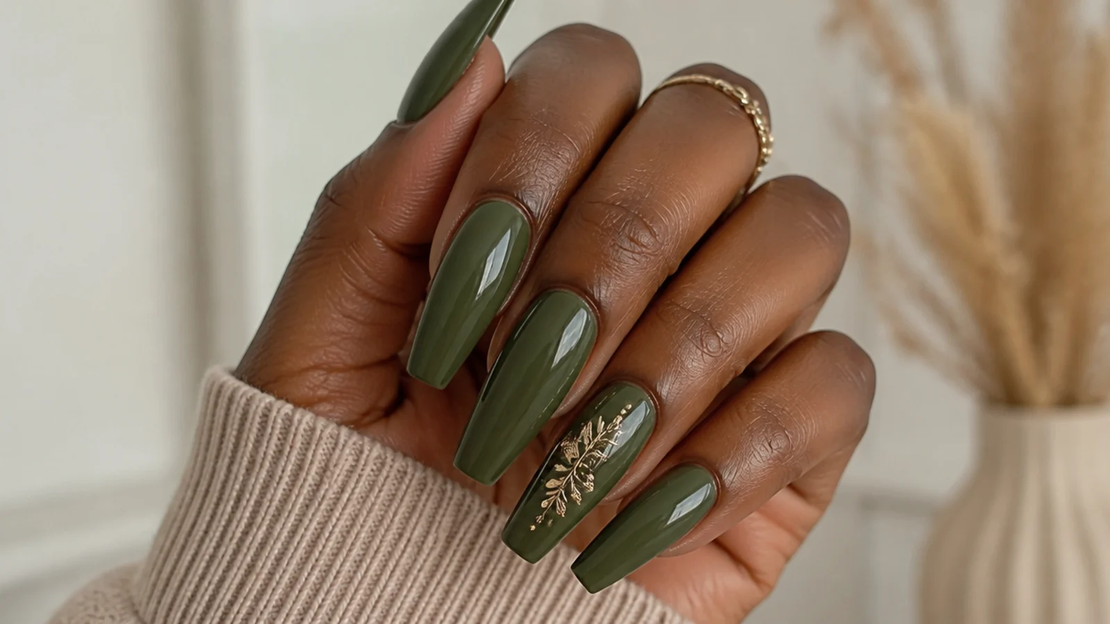 Rich deep olive green nails on deep skin, long coffin shape