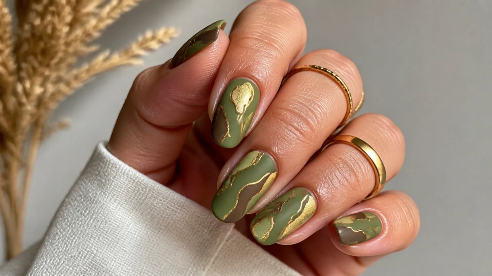 Olive green nails with brown and gold abstract boho shapes