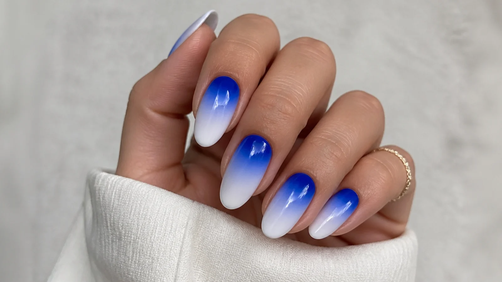 Royal blue to white ombre nails fading from cuticle to tip