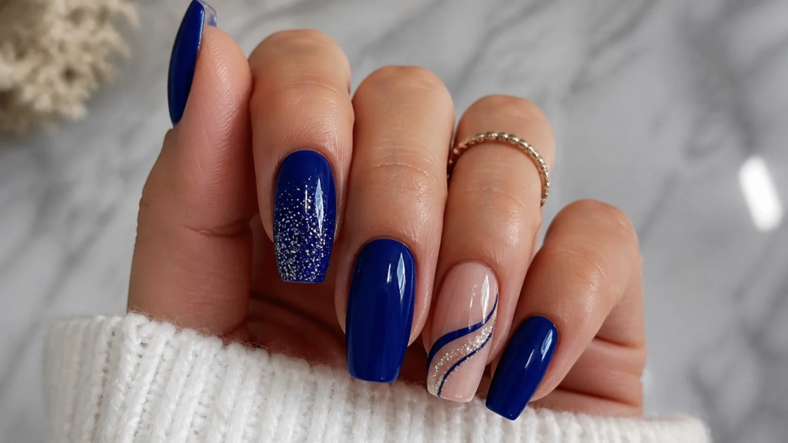 Royal blue nails styled for prom, a wedding and everyday wear