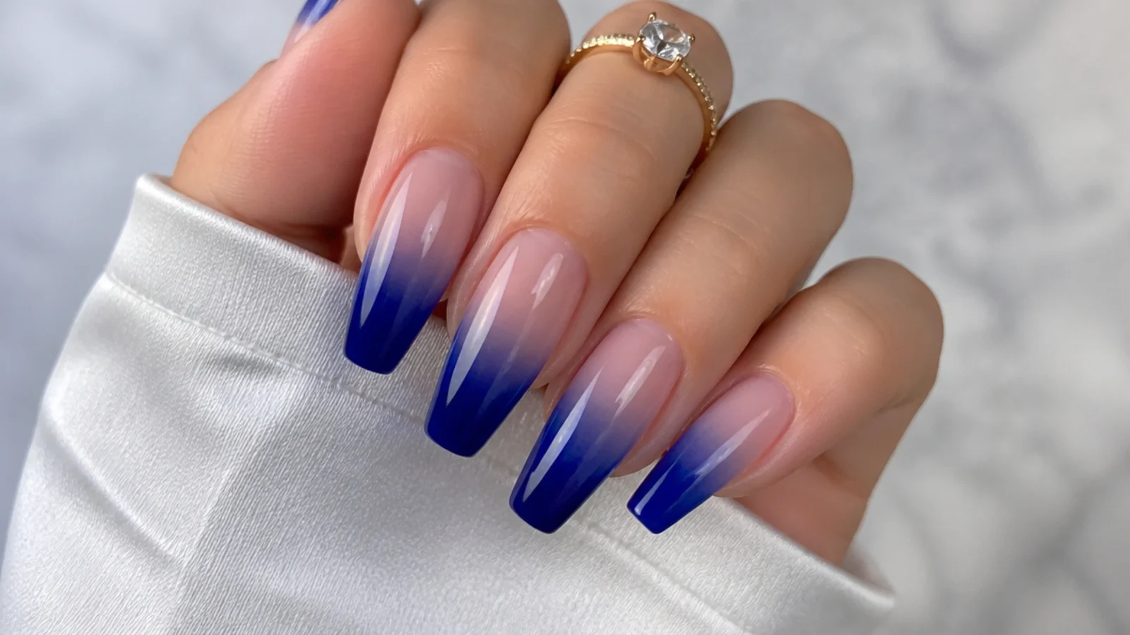 Royal blue to nude ombre acrylic nails faded on coffin nails