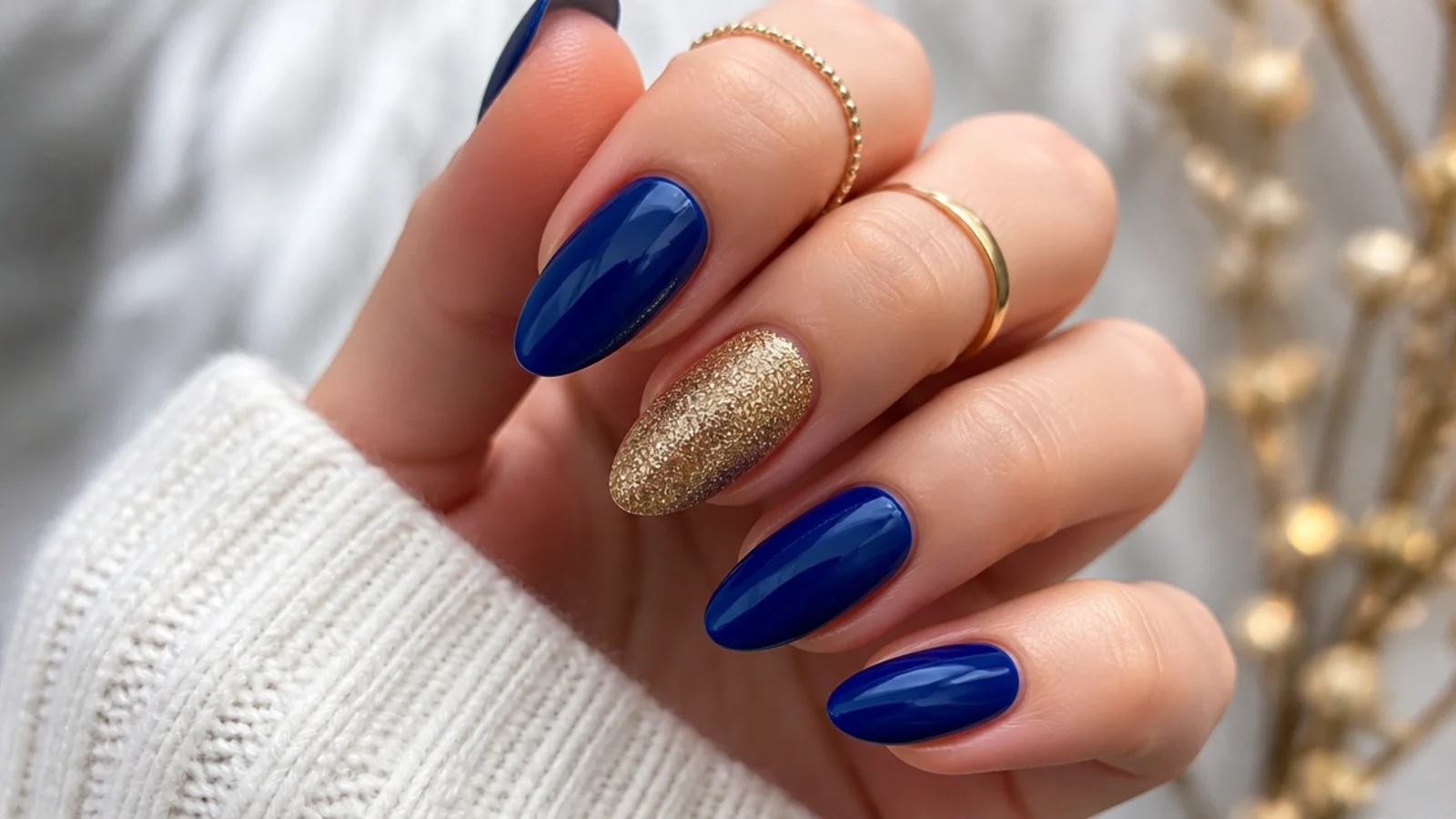 Royal blue nails with textured gold sugar glitter accent nails