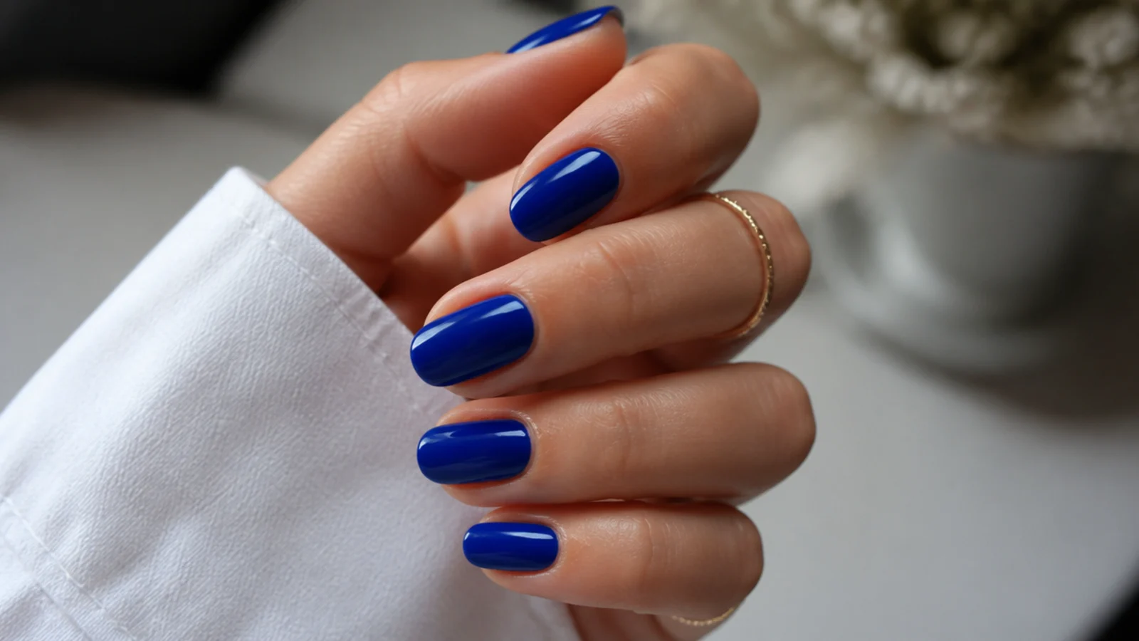 Two coats of royal blue gel building a deep, true cobalt color