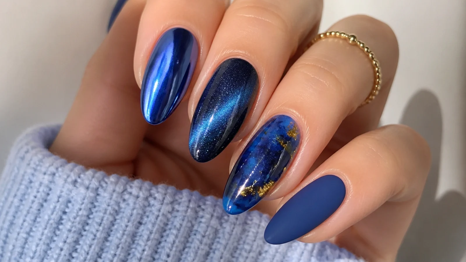 Royal blue nails in glossy, chrome, cat-eye, jelly and matte finishes