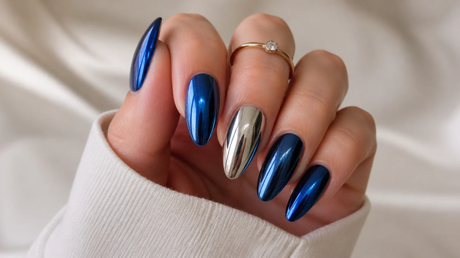 Royal blue chrome nails with cool silver chrome accent nails