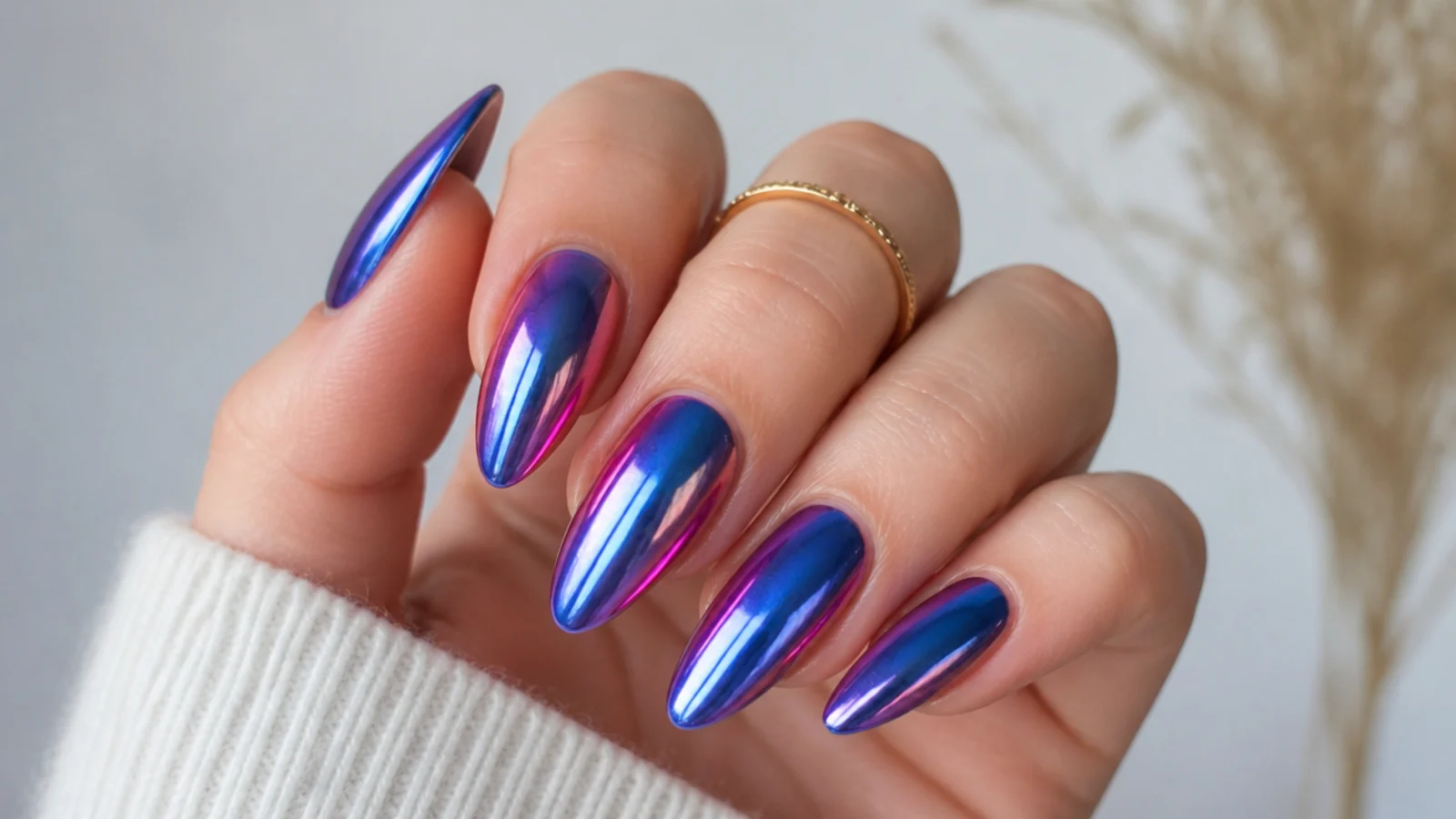 Royal blue nails with iridescent aurora chrome shifting purple and pink