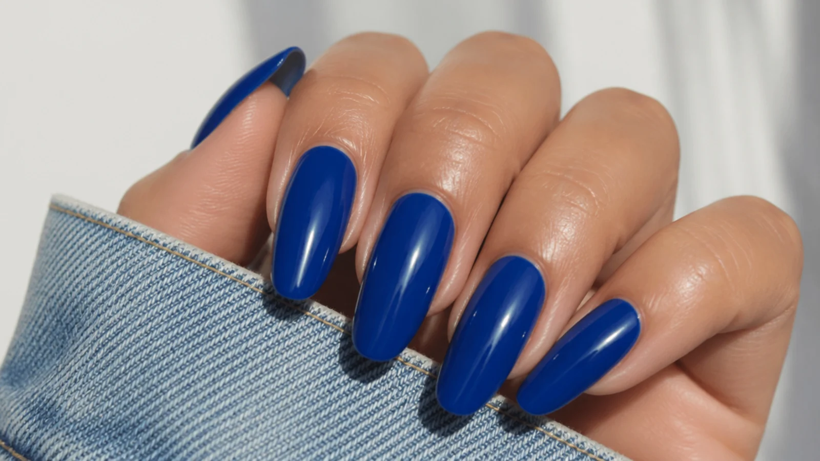 Two coats of cobalt royal blue gel building a true saturated color
