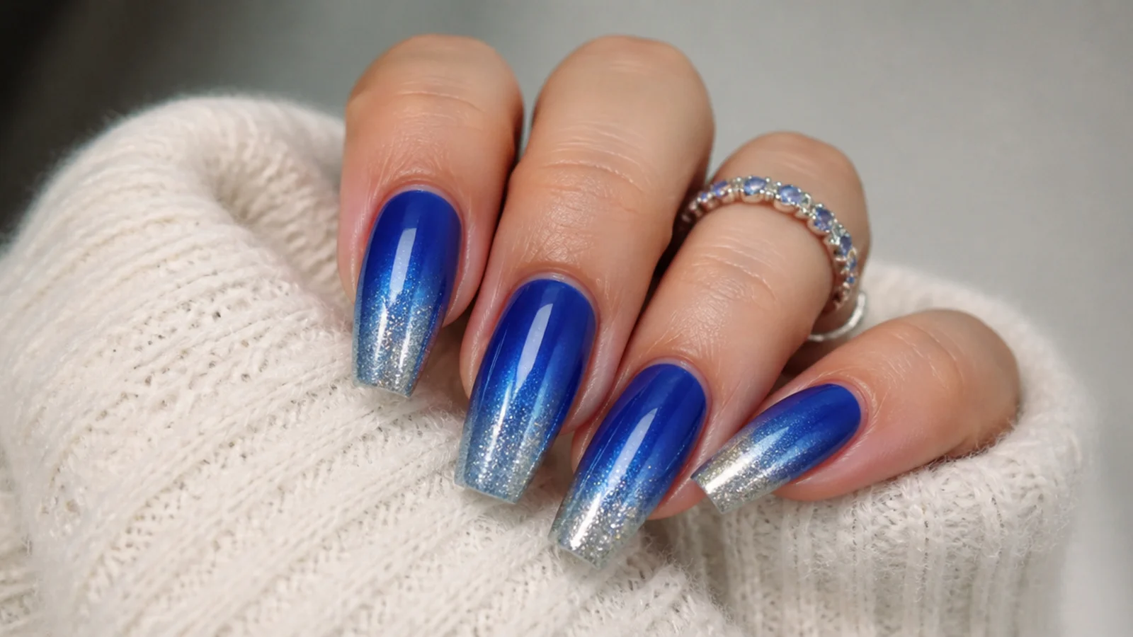 Coffin nails fading from royal blue into silver chrome at the tips