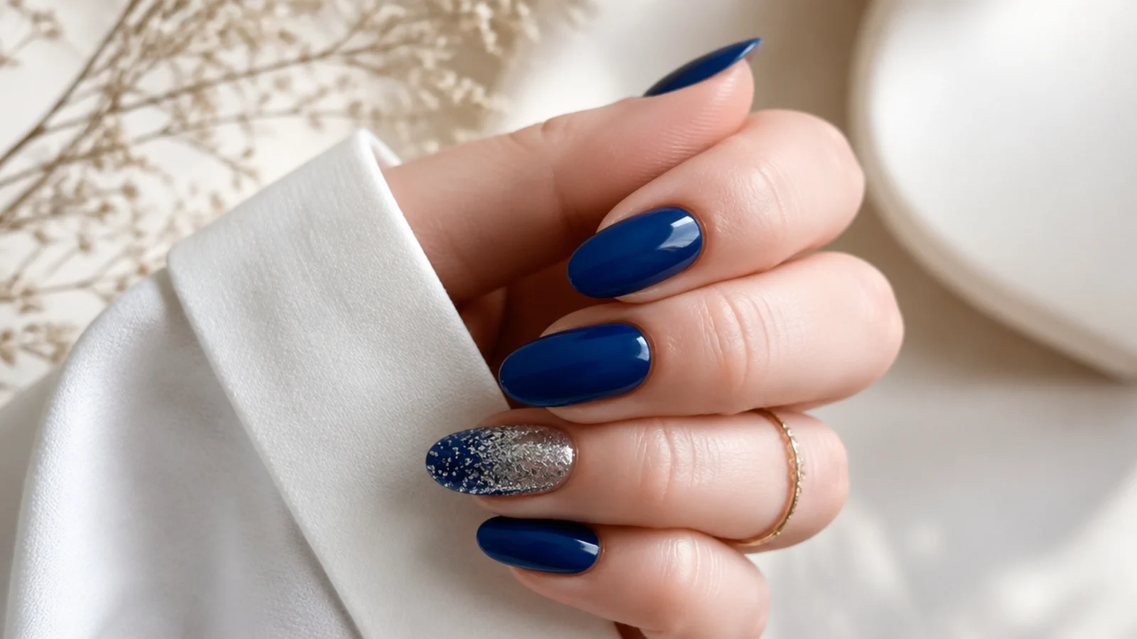 Royal blue nails with a silver glitter ombre accent nail