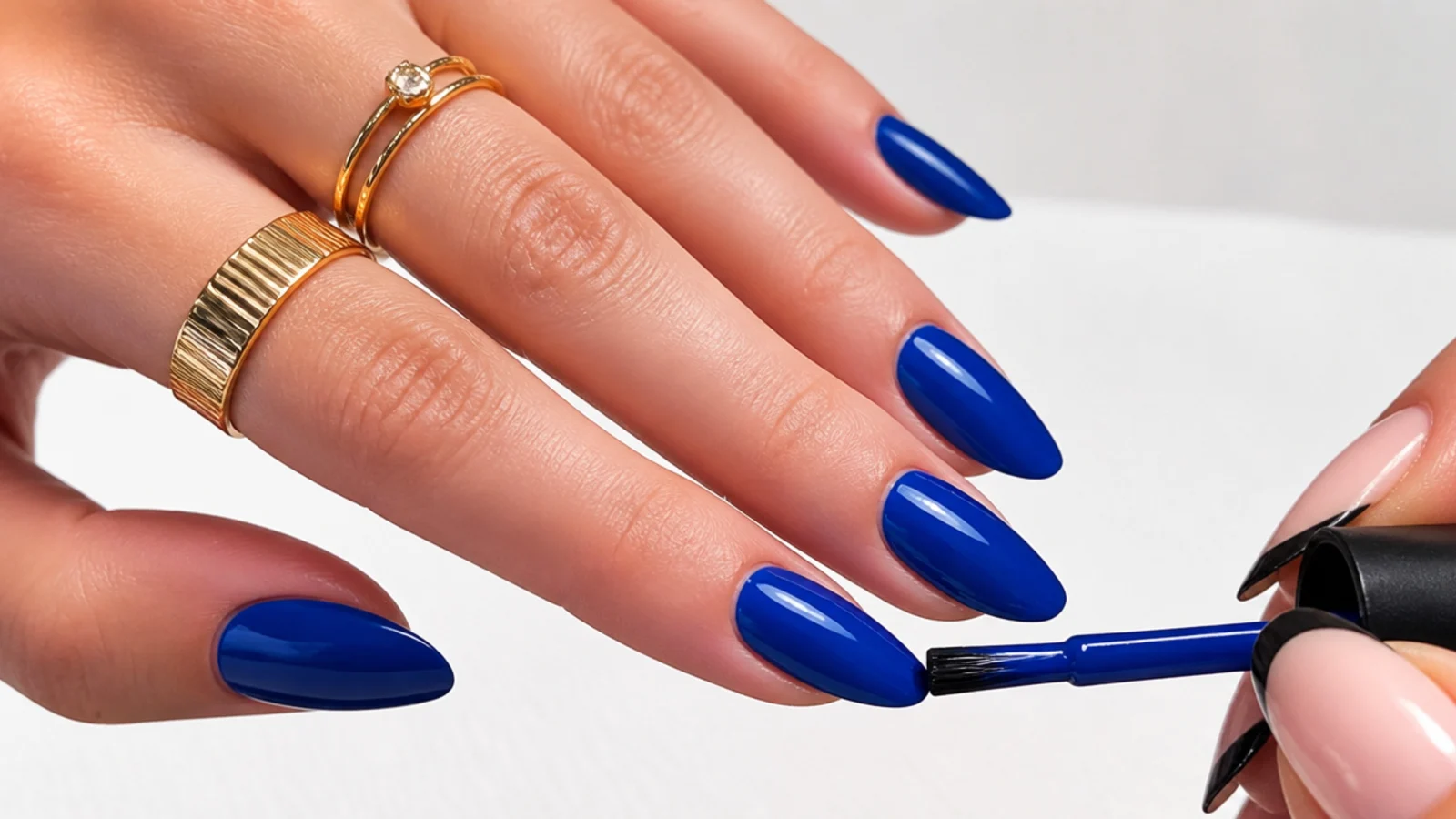 Two coats of royal blue gel building a deep true cobalt on a nail