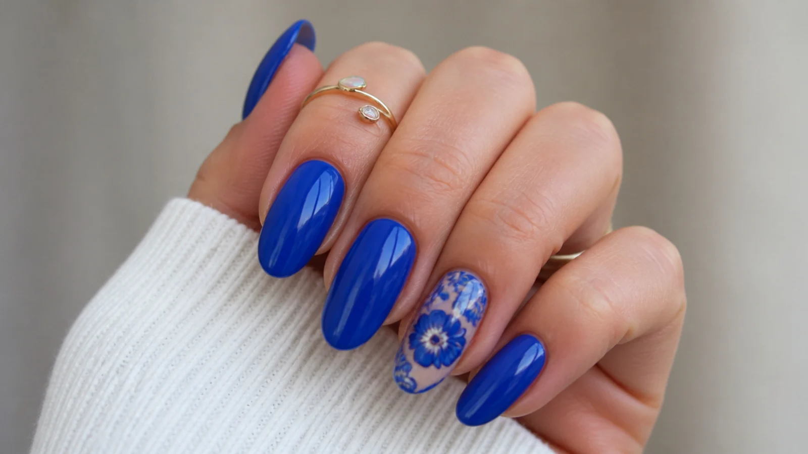 A well-sealed royal blue gel manicure with cuticle oil for longevity