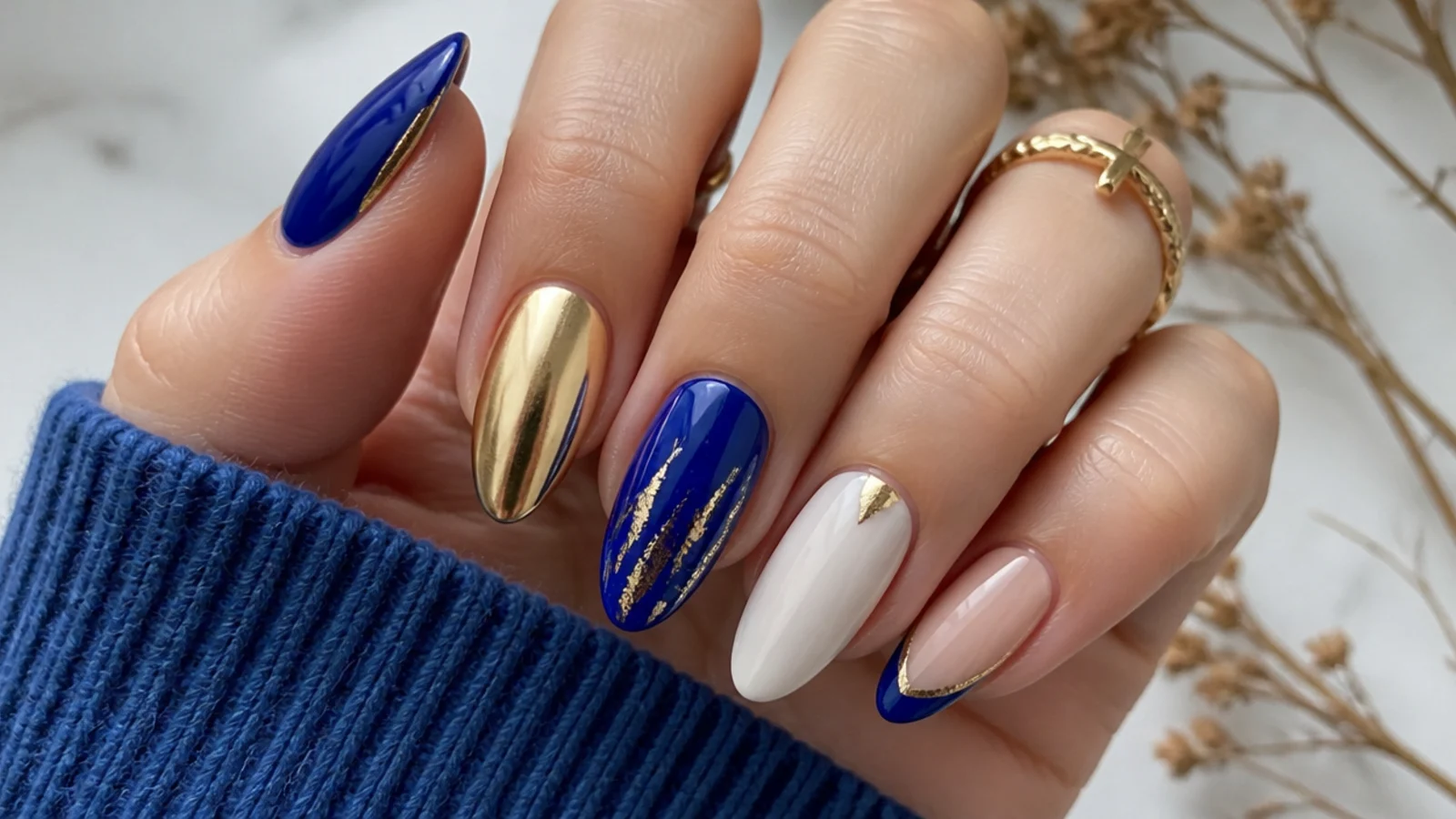 Royal blue nails shown beside gold, silver, white and nude accents