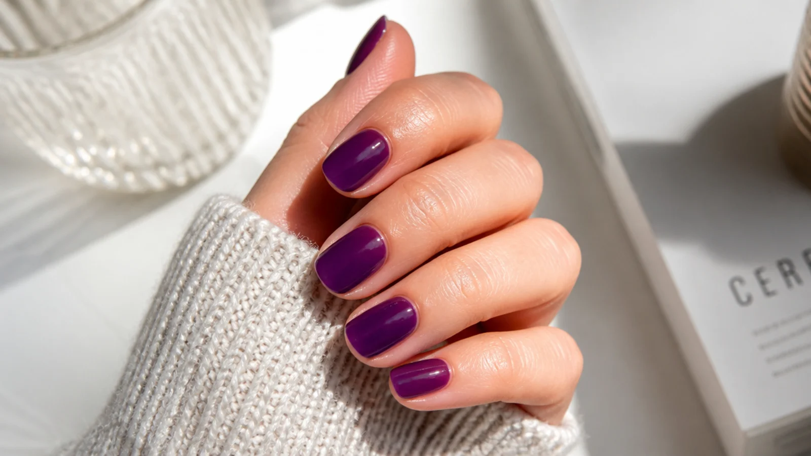 Short nails in translucent grape purple jelly with a deep glossy candy finish
