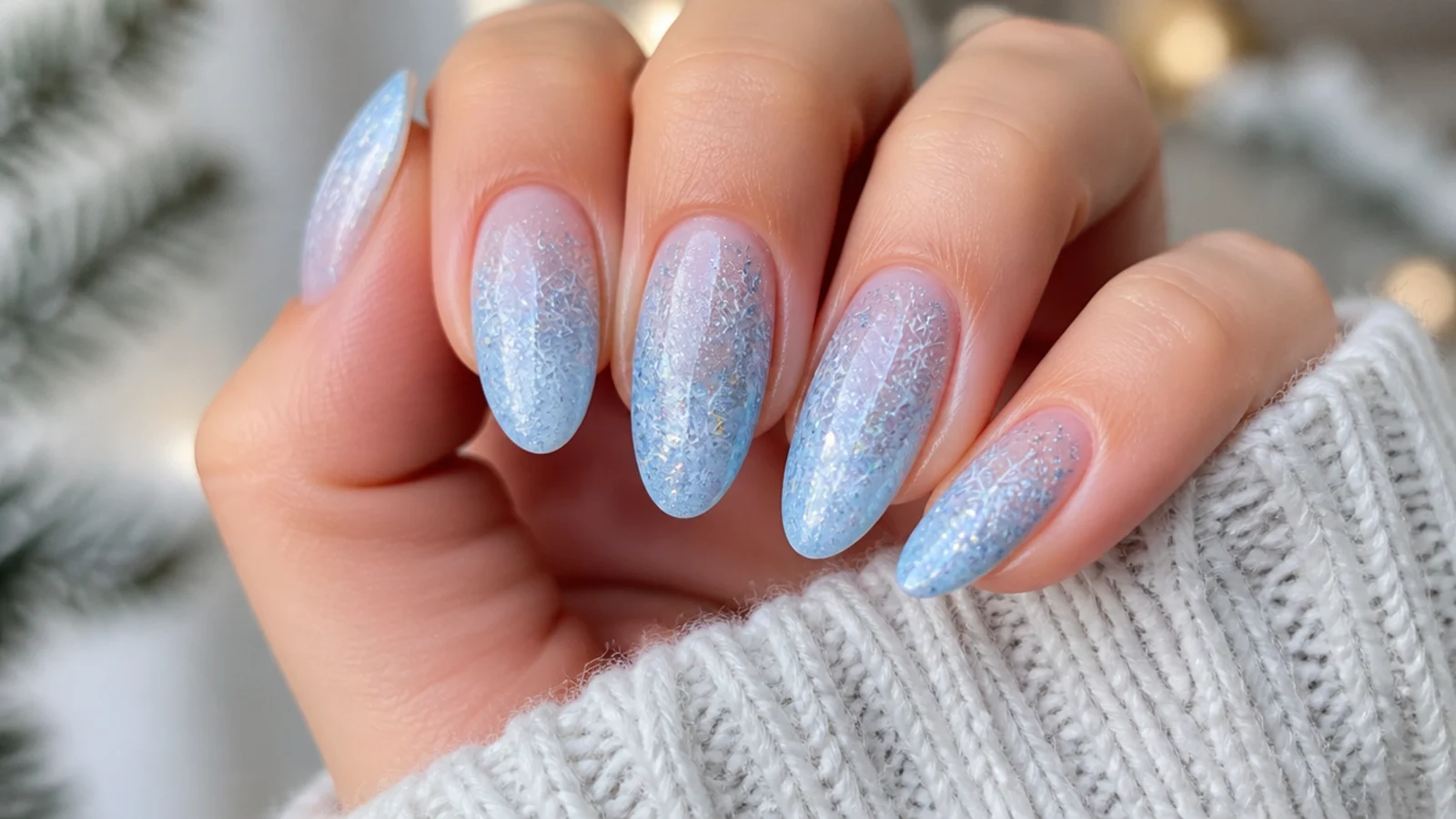 Full icy blue winter snowflake nails with white and silver flakes on every nail