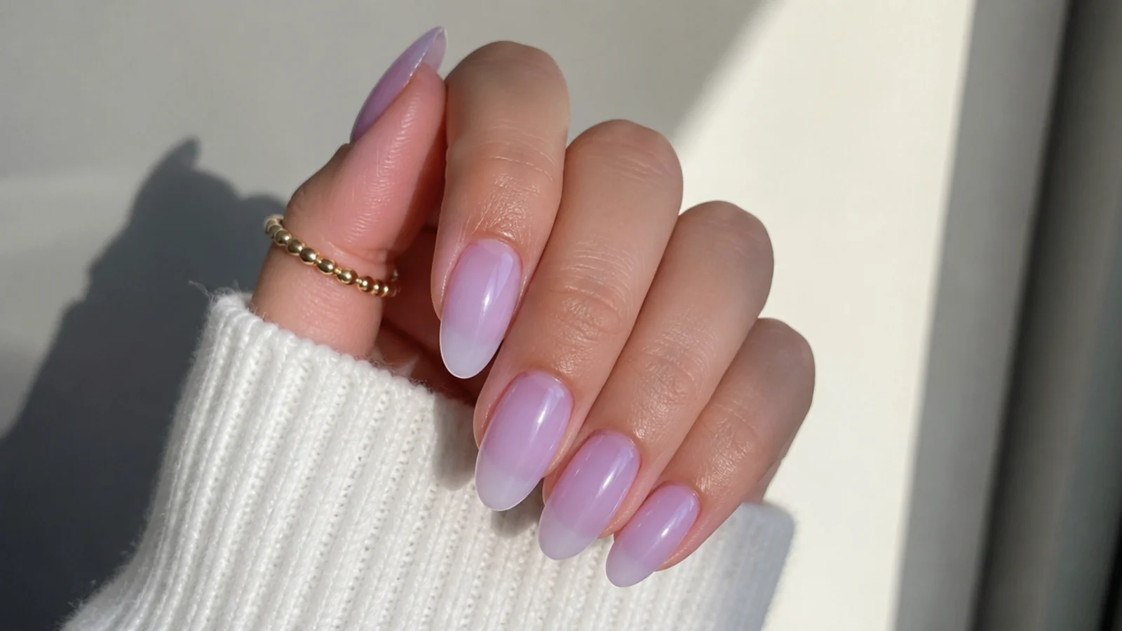 Sheer lilac almond soap nails with a soft translucent wash
