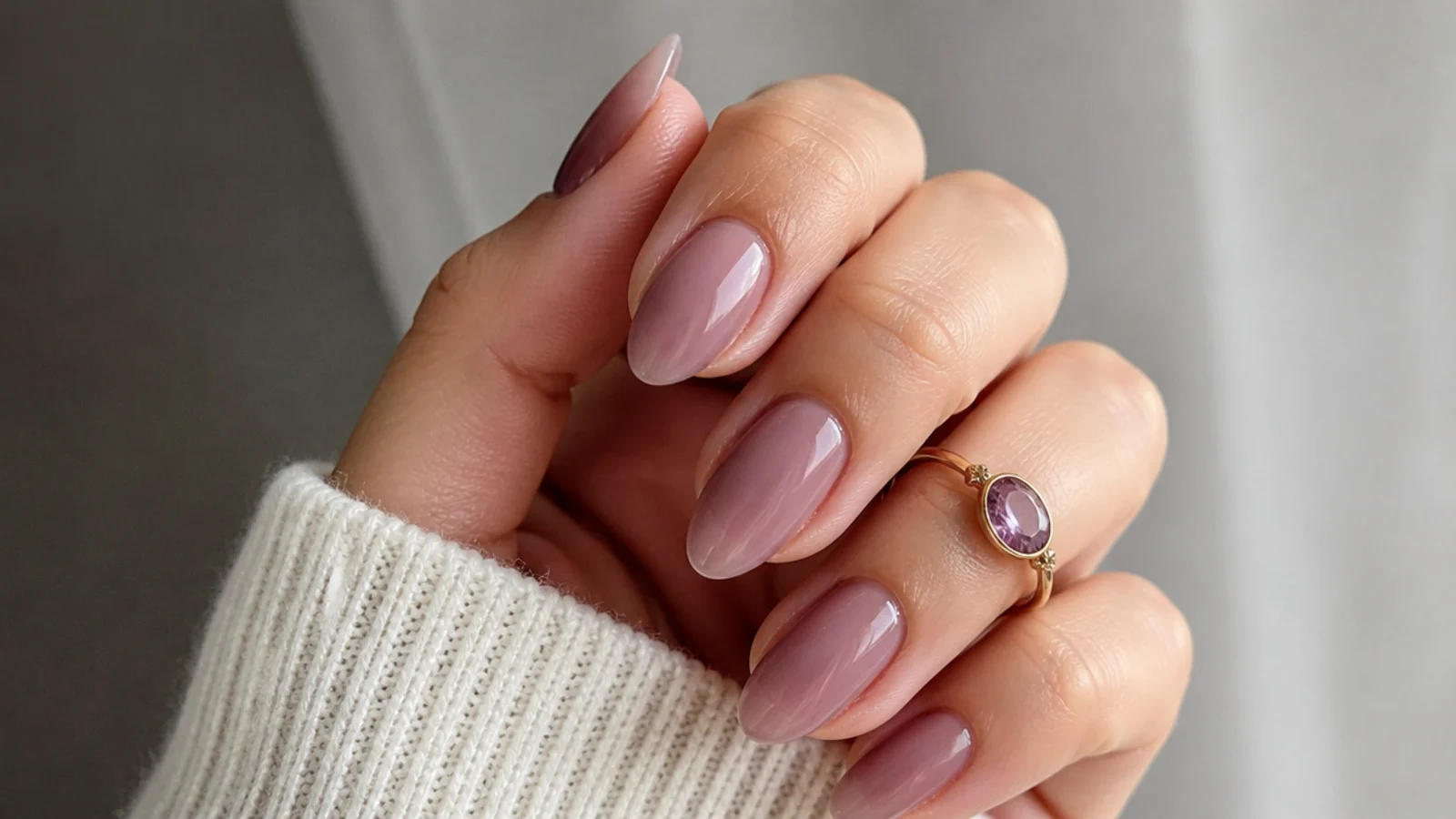 Sheer soft mauve almond soap nails with a muted translucent finish