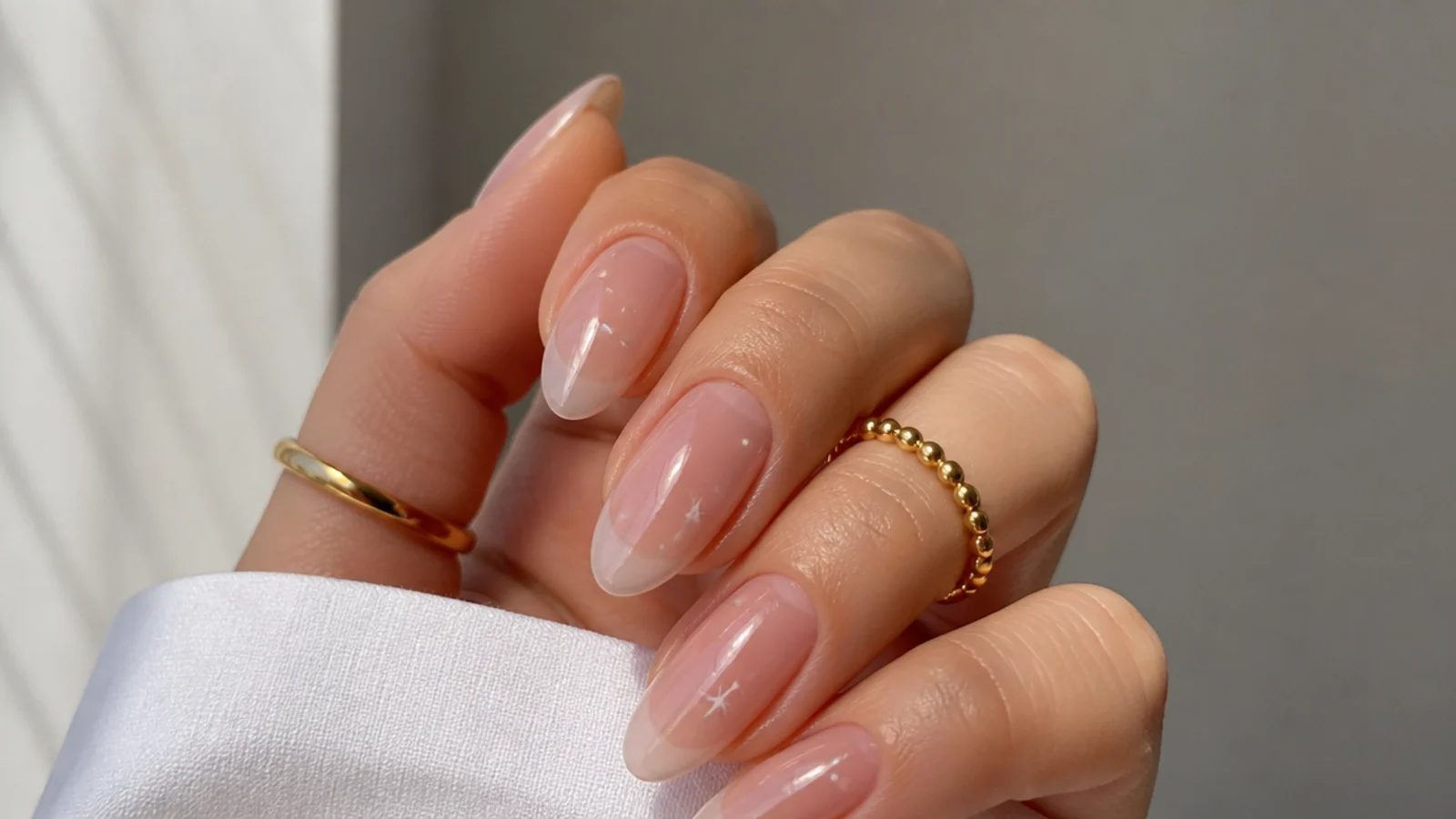 Sheer gel soap nails with a durable glassy finish on almond nails
