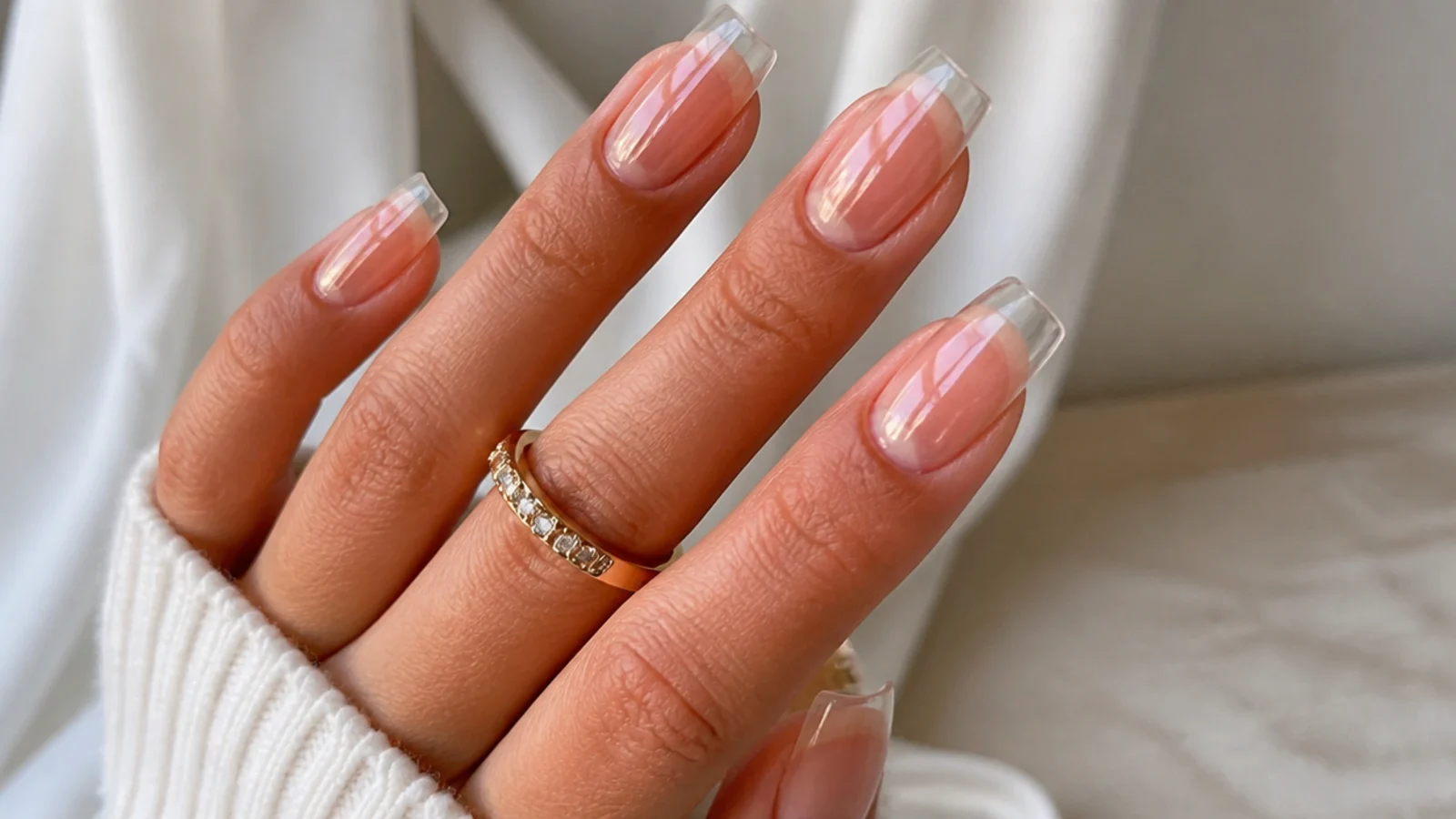 Long squoval soap nails in a fully clear high-shine glass finish