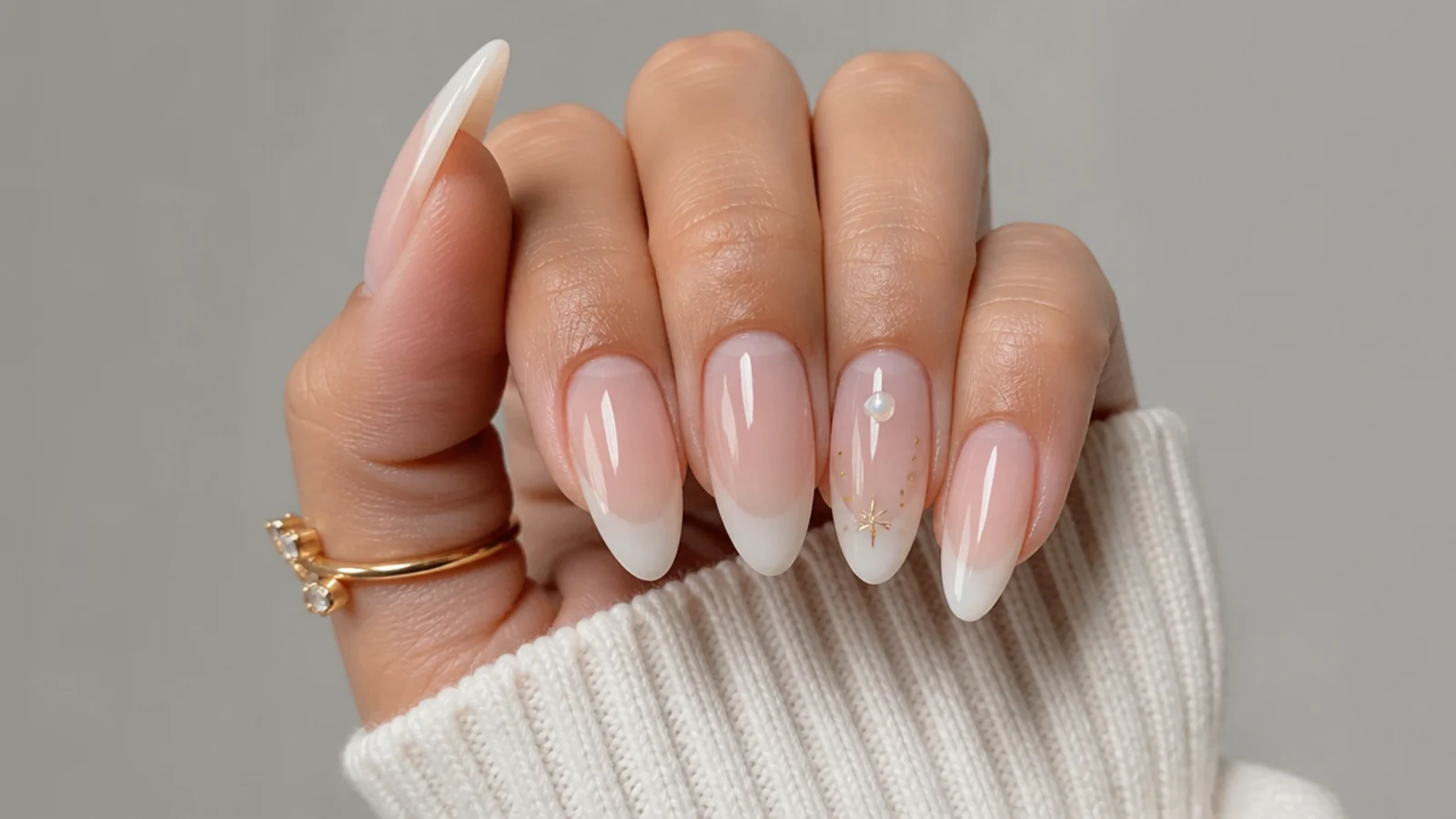 Long almond soap nails with a soft sheer milky French tip